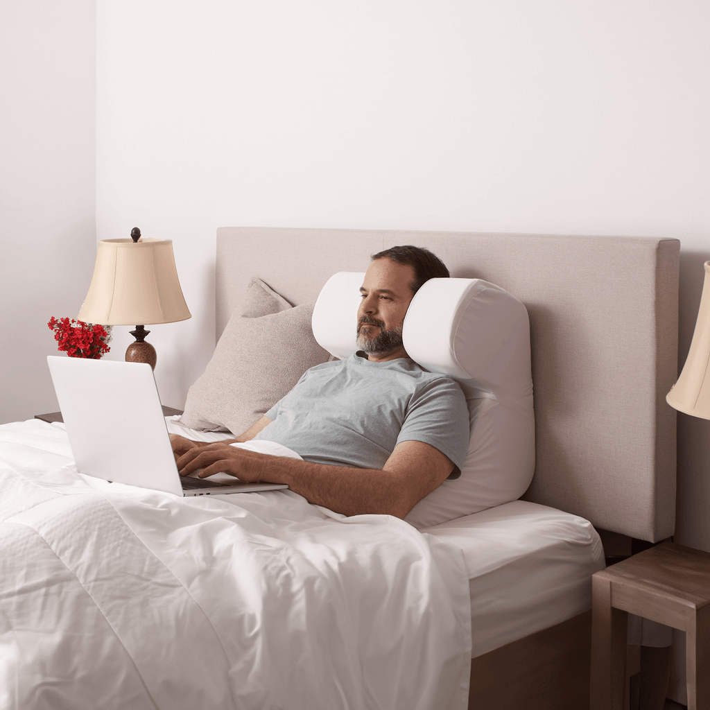 Anti-snoring memory foam wedge pillow designed to elevate head and improve sleep posture 